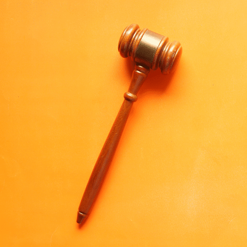 boca raton legal gavel against yellow background