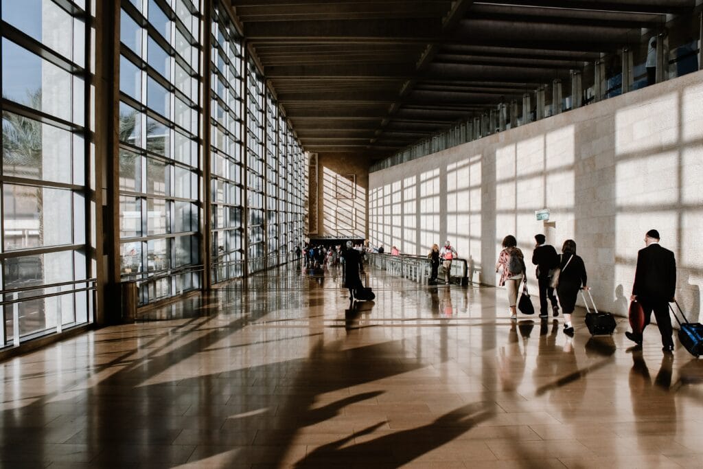 Business travelers line up at Palm Beach International Airport.